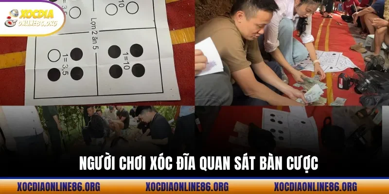 Người chơi xóc đĩa quan sát bàn cược